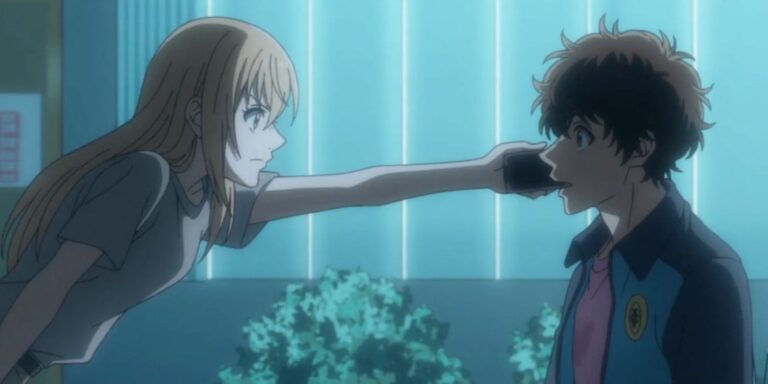 Hana holds phone for Ashito