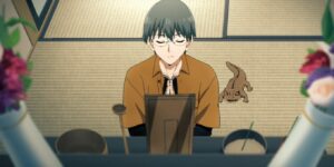 Yuuhi prays at his father's shrine in Lucifer and the Biscuit Hammer