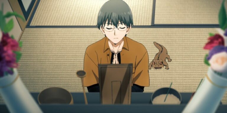 Yuuhi prays at his father's shrine in Lucifer and the Biscuit Hammer
