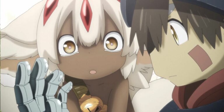 Faputa and Reg examine his robot hand