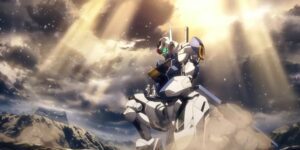 Suletta and Miorine in The Witch From Mecury standing in the hand of the Gundam