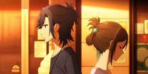 Horimiya and Miyamura facing back to back.