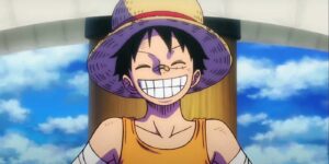 One Piece's Luffy smiles at his friends