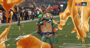 Leonardo DiCaprio é visto como Tartarugas Ninja atirando pizzas durante o Super Bowl da Nickelodeon